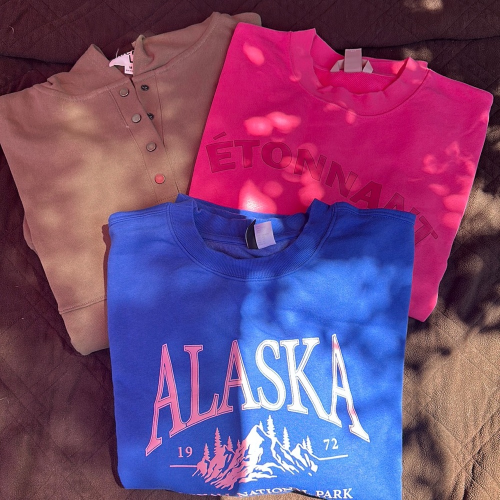 Three sweatshirts